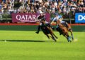 two person playing polo during daytime