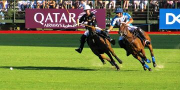two person playing polo during daytime